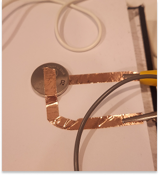 Positive side of the battery is connected to Positive side of LED, Negative side is connected to the Negative Prong in the Pot