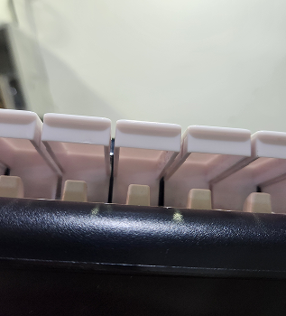 Space between the keys and the board